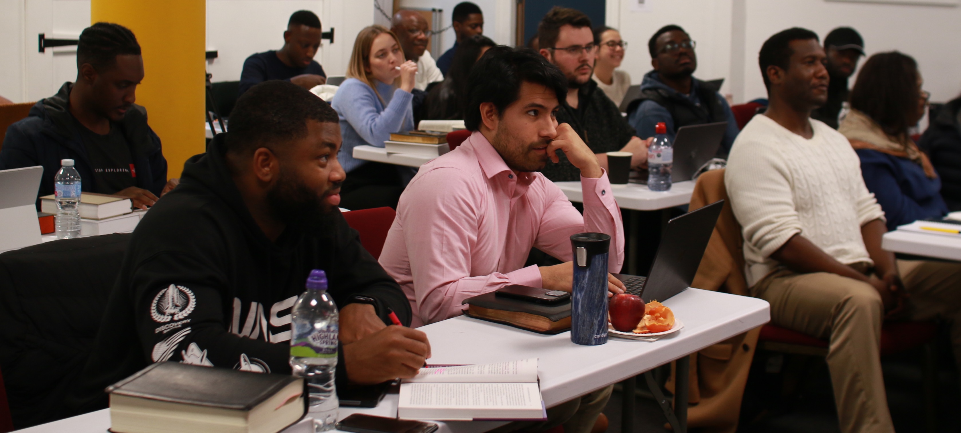 The Hermeneutics and Theology Survey class sitting and learning